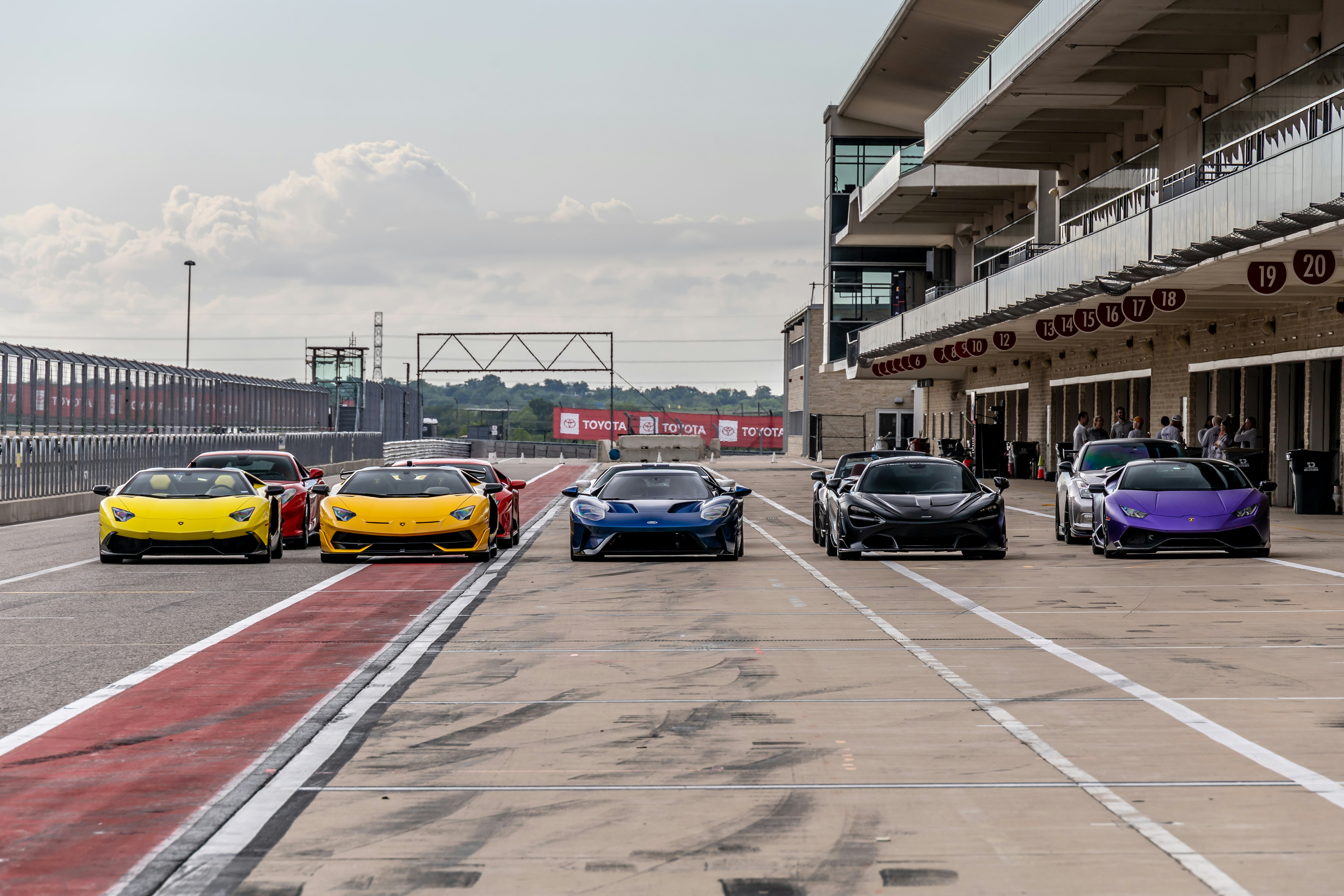 cars parked on parking lot during daytime